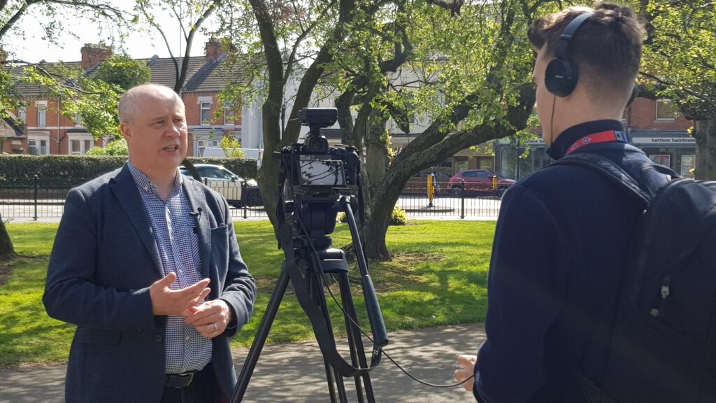 Commissioner Stephen Mold being interviewed at today's launch